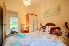 Double bedroom is ideally situated for access to the sunroom