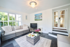 The sun lounge offers a second television and is the perfect place to relax